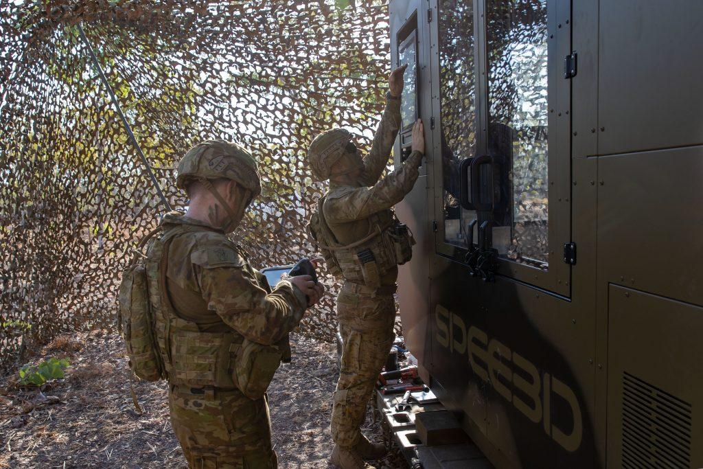 Australian Army Corporal Sean Barton (right) and artisan Naythan Ryan from the 1st Combat Service Support Battalion, are deploying WarpSPEE 3D printers Australian Army Corporal Sean Barton (right) and artisan Naythan Ryan from the 1st Combat Service Support Battalion, are deploying WarpSPEE 3D printers